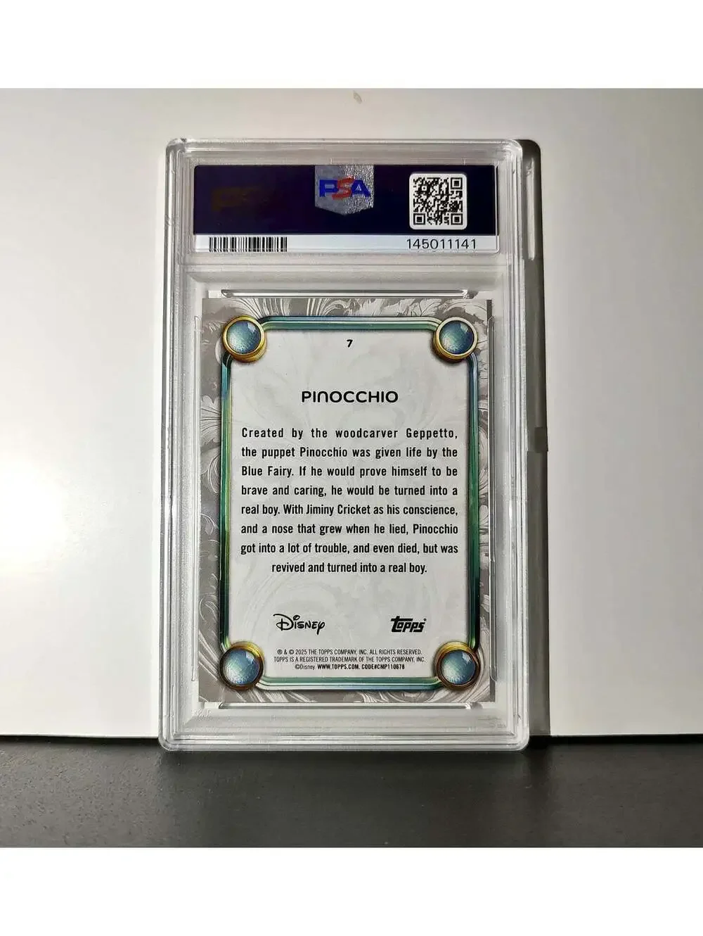 Pinocchio 2025 Topps Disney Wonder #7 Winter Variant Card Pinocchio PSA 8